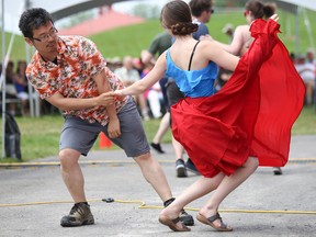 Eric Zhang of Toronto and Jessica Janes of Kingston cut a rug during the Trenton Big Band Festival on Sunday July 23, 2017 in Trenton, Ont. Tim Miller/Belleville Intelligencer/Postmedia Network