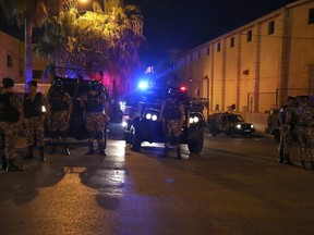 Security forces stand outside the Israeli embassy in the residential Rabiyeh neighbourhood of the Jordanian capital Amman following an 'incident' on July 23, 2017. A Jordanian was killed and an Israeli seriously wounded at the Jewish state's embassy in Amman, a security source said. KHALIL MAZRAAWI/AFP/Getty Images