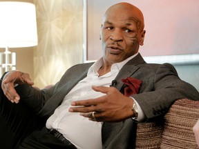Boxing legend Mike Tyson speaks with the Toronto Sun's Steve Buffery (unseen) inside the MGM Grand hotel in Las Vegas on Friday, March 23, 2012. LYLE ASPINALL/CALGARY SUN