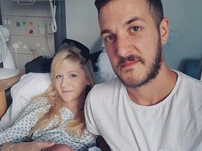 This is an undated hand out photo of Chris Gard and Connie Yates with their son Charlie Gard provided by the family, at Great Ormond Street Hospital, in London. (Family of Charlie Gard via AP)