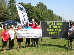 From left to right are Cindy Bissett, Debra Robertson, Sherry Postma, Gwen Devereaux, Marni Van Aaken, Robert Brown, Dawn Riley and Marjorie Robinson.