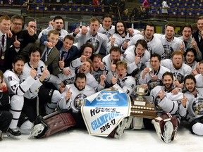 The MacEwan University Griffins men's hockey team poses with the 2016-17 ACAC championship banner following a 4-3 overtim win over the NAIT Ooks in Edmonton on Sunday, March 19, 2017. MacEwan also won the ACAC title in women's hockey this season. It was the men's first championship since 2004.