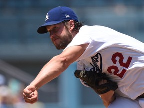 Clayton Kershaw of the Los Angeles Dodgers pitches in the second inning against the Atlanta Braves at Dodger Stadium on July 23, 2017. (Lisa Blumenfeld/Getty Images)