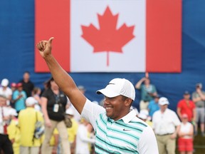 Jhonattan Vegas, of Venezuela, celebrates after winning the Canadian Open golf tournament at Glen Abbey in Oakville, Ont., on July 24, 2016. (THE CANADIAN PRESS/Nathan Denette)