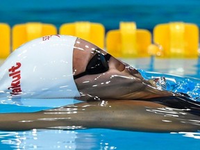 Kylie Masse of Canada competes in the women's 100-meter backstroked semifinal during the swimming competitions of the World Aquatics Championships in the Duna Arena in Budapest on July 24, 2017. (Tamas Kovacs/MTI via AP)