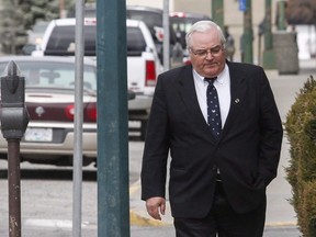 Winston Blackmore, who is accused of practising polygamy in a fundamentalist religious community, returns to court after a lunch break in Cranbrook, B.C., Tuesday, April 18, 2017. A British Columbia judge is expected to issue her verdict today for two former religious leaders accused of one count each of polygamy. Winston Blackmore is alleged to have married 24 women in the practise of "celestial" marriage, while the trial earlier this year heard that James Oler has five wives. (THE CANADIAN PRESS/Jeff McIntosh)