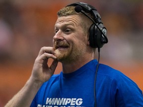 Winnipeg Blue Bombers' head coach Mike O'Shea scratches his chin on the sideline during the second half of a CFL football game against the B.C. Lions in Vancouver, B.C., on Friday July 21, 2017. THE CANADIAN PRESS/Darryl Dyck