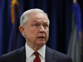 In this July 21, 2017 file photo, Attorney General Jeff Sessions speaks in Philadelphia. President Donald Trump took a new swipe at on Monday, July 24, 2017, referring to him in a tweet as “beleaguered” and wondering why Sessions isn’t digging into Hillary Clinton’s alleged contacts with Russia. (AP Photo/Matt Rourke, File)