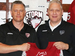 Jake Grimes (left) has rejoined George Burnett in Guelph with the Storm, the OHL team announced this week. (Guelph Storm photo)