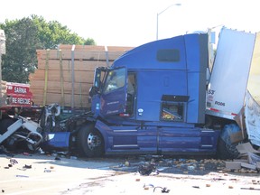 Two occupants of this truck suffered minor injuries during today's crash on westbound Highway 402 near Christina Street in Sarnia. None of the trucks involved were carrying hazardous goods. (NEIL BOWEN/Sarnia Observer)