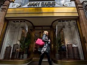 This is a April 24, 2017 file photo of the Jimmy Choo shop on New Bond Street, London. American fashion brand Michael Kors has bought luxury shoemaker Jimmy Choo in a deal worth $1.35 billion (896 million pounds.) Kors said Tuesday July 25, 2017 the London-listed Jimmy Choo is "the ideal partner" that will be bolstered with further development of its online presence. (Lauren Hurley/PA, File via AP)