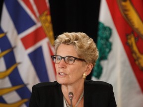 Ontario Premier Kathleen Wynne speaks during the final press conference at the Council of Federation meetings in Edmonton Alta, on Wednesday July 19, 2017. THE CANADIAN PRESS/Jason Franson