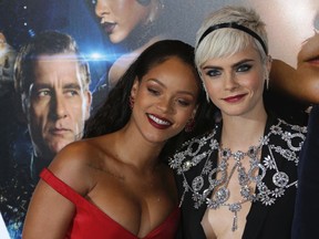 Actress Cara Delevingne, right, poses with Rihanna during the European film premiere of 'Valerian and the City of a Thousand Planets' in London, Monday, July 24, 2017. (Photo by Joel Ryan/Invision/AP)