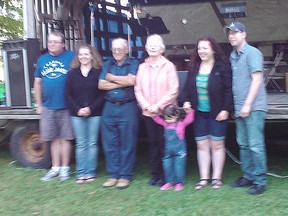 Lucy and Allan Miller and family, owners of the Holyrood General Store, presented $1,100 from their last pig roast to the Purple Grove Well Fund on July 15, 2017. The pig roast had been an annual event since 1968.