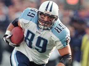 This Sunday, Dec. 5, 1999 file photo shows Tennessee Titans tight end Frank Wycheck during a football game against the Baltimore Ravens in Baltimore. Wycheck worries that concussions during his nine-year career have left him with chronic traumatic encephalopathy and he plans to donate his brain to research. “Some people have heads made of concrete, and it doesn't really affect some of those guys,” he said. “But CTE is real.” (AP Photo/Roberto Borea)