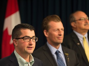 From left, Nathan Cooper, Mike Ellis, Deputy Leader, Richard Godfried, House Leaser. Interim United Conservative Party Leader Nathan Cooper introduced the United Conservative Party caucus leadership on July 25, 2017 at the Alberta Legislature. Photo by Shaughn Butts / Postmedia