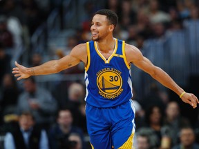 In this Nov. 10, 2016, file photo, Golden State Warriors guard Stephen Curry celebrates after hitting a 3-point basket and drawing a foul from the Denver Nuggets during the second half of an NBA basketball game, in Denver. (AP Photo/David Zalubowski, File)