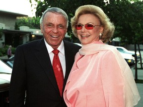 In this July 11, 1996 file photo Frank Sinatra and his wife Barbara arrive at Our Lady of Malibu church to renew their wedding vows on their 20th wedding anniversary in Malibu, Calif. (AP Photo/Mark J. Terrill,File)