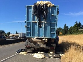 Heat caused dough to rise, spill out of this dump truck on a Tacoma, Wash. highway Monday afternoon. (Twitter/wspd1pio)