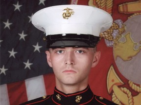 In this undated photo provided by David Taylor Sr., former Marine David Taylor poses for an official portrait while in the Marine Corps. (U.S. Marine Corps/David Taylor Sr. AP)