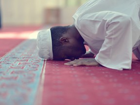 A Muslim man is pictured during prayers at a mosque in this undated file photo. (FS-Stock/Getty Images)