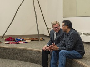 Alberta Education Minister David Eggen sits with Billy Joe Laboucan, Chief of the Rubicon Lake Band in a Literacy and Drama Indigenous  Languages classroom. Eggen, announced a $665,000 grant to increase the number of indigenous language instructors in the province. Shaughn Butts / Postmedia