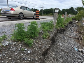 Construction of a new multi-purpose pathway on Bath Road has been delayed until next year because of shoreline erosion by high water levels on Lake Ontario, the city announced on Tuesday. (Elliot Ferguson/The Whig-Standard)