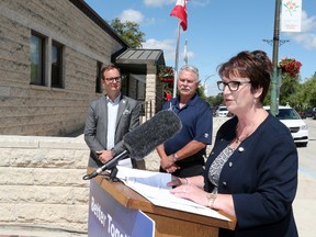 Indigenous and Municipal Relations minister Eileen Clarke announces the province's investment of $12 million for municipal roads while in Stonewall, Man., on Tuesday, July 25, 2017. The Municipal Road Improvement Program, which is a 50-50 cost-shared funding program between the province and AMM for municipal road projects. A total of 188 projects were approved in 2017 in 99 municipalities through the Municipal Road Improvement Program. (Brook Jones/Stonewall Argus & Teulon Times/Postmedia Network)