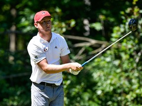Jared du Toit of Canada hits his tee on the fifteenth hole during the final round of the Mackenzie Investments Open at Club de Golf Les Quatre Domaines on July 23, 2017. (Minas Panagiotakis/Getty Images)