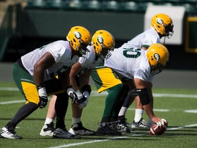 The Edmonton Eskimo offensive line practices in preparation of Friday's game against the B.C. Lions on Tuesday July 25, 2017, at Commonwealth Stadium.