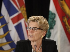 Premier Kathleen Wynne speaks during a news conference in Edmonton on Wednesday, July 19, 2017. (THE CANADIAN PRESS/PHOTO)