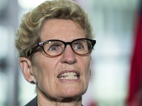 Premier Kathleen Wynne speaks during an event in Toronto on Wednesday, June 14. (CRAIG ROBERTSON/TORONTO SUN)