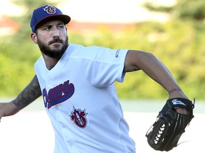 Ottawa Champions’ Phillippe Aumont delivers a pitch for the Can-Am League all-stars during last night’s game against the team representing the American Association. (JULIE OLIVER/Postmedia Network)