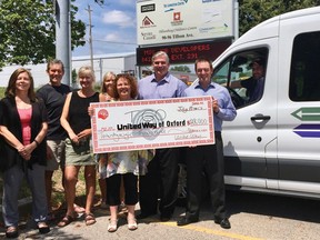 Members of  Tillsonburg’s T:Go Call ‘n Ride Steering Committee met last Tuesday with United Way of Oxford’s Executive Director, Kelly Gilson, to recognize the $28,000 of United Way support that was directed to the still young bus initiative earlier this year. From left are Cathy Hudson, Chief Executive Officer, Community Living Tillsonburg; John Verbakel, Tillsonburg Transportation Steering Committee, Chairperson; Carolijn Verbakel, Acting Executive Director, Social Planning Council Oxford; Susan Rebry, Director, Employment and Literary Services, Multi-Service Centre; Kelly Gilson, Executive Director, United Way Oxford; Geoff Reekie, Executive Director, Tillsonburg and District Multi-Service Centre; John Preston, Community Transportation and T:Go Coordinator; and Larry Ongena, T:Go bus driver. (Contributed photo)