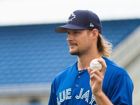 Toronto Blue Jays pitcher Matt Dermody grips the ball during baseball spring training in Dunedin, Fla., on Feb. 22, 2017. (NATHAN DENETTE/The Canadian Press files)