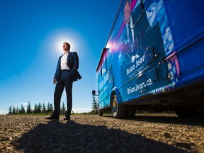 Former Wildrose leader Brian Jean stands near his campaign RV after launching his bid for leadership of the new United Conservative Party at an event near Airdrie on Monday July 24, 2017. Gavin Young/Postmedia