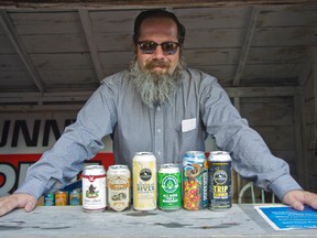 Andrew Hilton Wine & Spirits owner Kyle Baines showcases the six delicious craft beers brewed right here in Alberta. | Caitlin Clow photo/Pincher Creek Echo