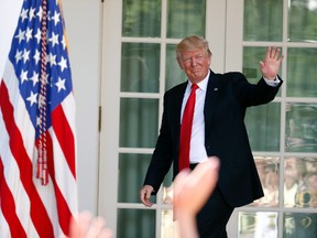 President Donald Trump waves as he leaves the Rose Garden of the White House in Washington, Wednesday, July 26, 2017, after speaking during an event with the American Legion Boys Nation and the American Legion Auxiliary Girls Nation. (AP Photo/Alex Brandon)