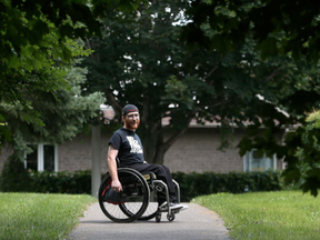 Kyle Humphrey near his home in Ottawa Ontario Monday July 17, 2017. Several years after his parents were told they should put him in a home, he rapelled down a building in his wheelchair. (Tony Caldwell, Postmedia)