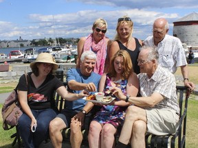 Members of the Canadian Diabetes Association, front row from left, Kristen Kimball-Evans, Mike Nimeh, Betsy Lake and Mel Viner and, back row from left, Donald Mann, Tammy Selena Tuck and Deanna Davies of Boys and Girls Club of Kingston & Area gather in Confederation Park to sample a beet hummus entry at Taste of Kingston 2016. (Whig-Standard file photo)