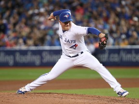 Joe Smith of the Toronto Blue Jays delivers a pitch in the seventh inning during MLB action against the Oakland Athletics at Rogers Centre on July 25, 2017. (Tom Szczerbowski/Getty Images)