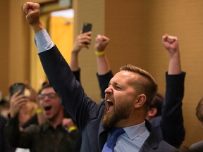 Wildrose MLA Derek Fildebrandt reacts as it is announced that the wild rose party has voted to unite with the Progressive Conservatives, in Red Deer Saturday July 22, 2017.