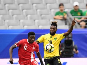 Canada's Alphonso Davies vies for the ball during their Gold Cup game against Jamaica last week. (GETTY IMAGES)