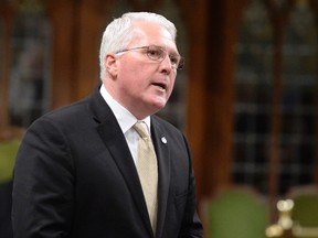 MP John Brassard takes apart in question period in Ottawa on Friday June 2, 2017. THE CANADIAN PRESS/Adrian Wyld