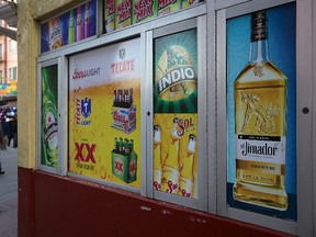 An advertisement for Mexican beer and tequila is displayed on the side of a convenience store on January 26, 2017 in Tijuana, Baja California. (Photo by Justin Sullivan/Getty Images)