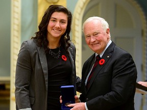 Belleville's Cindy Nelles with Governor General David Johnston in Ottawa when she was honoured as one of the top-eight CIS All-Canadian student/athletes. (Submitted photo)