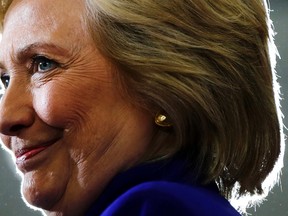 In this Sept. 21, 2016, file photo, Democratic presidential candidate Hillary Clinton pauses as she speak during a campaign stop at the Frontline Outreach Center in Orlando, Fla. Clinton is calling her new book "What Happened" and promising to let her "guard down" as she remembers her defeat last year to Donald Trump. Simon & Schuster told The Associated Press on Thursday, July 27, 2017, that Clinton will describe the "intense personal experience" of being the first woman nominated by a major party for president. (AP Photo/Matt Rourke, File)