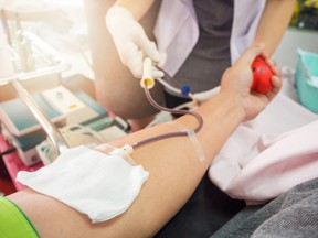 A nurse receives blood from a blood donor in hospital in this stock photo. (Getty Images)