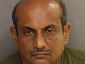 Balasubramanian Kandasamy, 50, is charged in an ongoing sexual assault investigation. (TORONTO POLICE/HANDOUT)