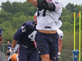 Rob Gronkowski of the New England Patriots makes a catch during Day 1 of training camp on the practice fields outside Gillette Stadium in Foxboro, Mass., on July 27, 2017. (John Kryk/Postmedia)